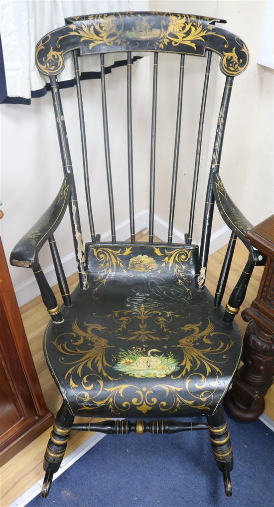 A decorated beech rocking chair